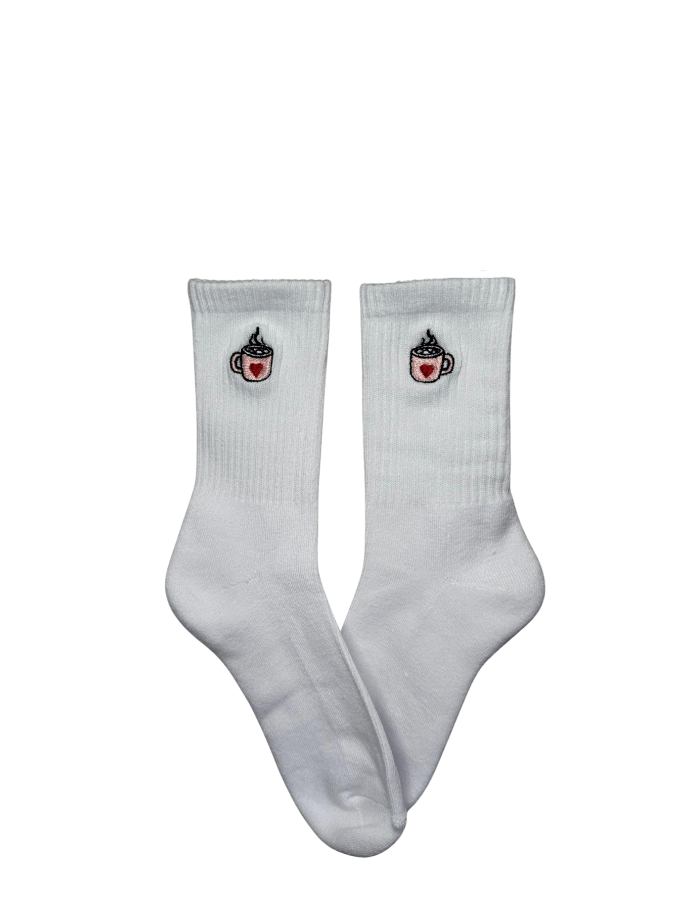 Chaussettes blanches hautes, 100% coton. Personnalisation des chaussettes grâce à des broderies. Il faut choisir parmi un choix de broderies dessinées à la main sur le thème de l’automne, saison automnale, Halloween, broderie cosy. La broderie est présente sur le côté extérieur des chaussettes. Toutes les broderies sont faites à la commande selon la personnalisation choisie. Ici, il s’agit de la broderie tasse de chocolat chaud rose avec un coeur rouge et marshmallow. 