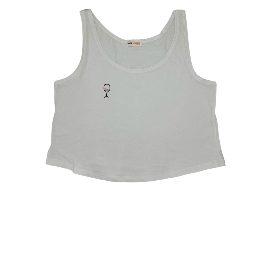 Débardeur blanc court, crop top, 100% coton. Personnalisation du débardeur grâce à des broderies. Il faut choisir parmi un choix de broderies dessinées à la main sur le thème de l’été sur la Côte d’Azur dans les Alpes Maritimes, 06. Il faut aussi choisir la position de la broderie entre à gauche côté cœur, à droite ou au milieu. Toutes les broderies sont faites à la commande selon la personnalisation choisie. Ici, il s’agit de la broderie verre de vin rosé, rose clair et noir.